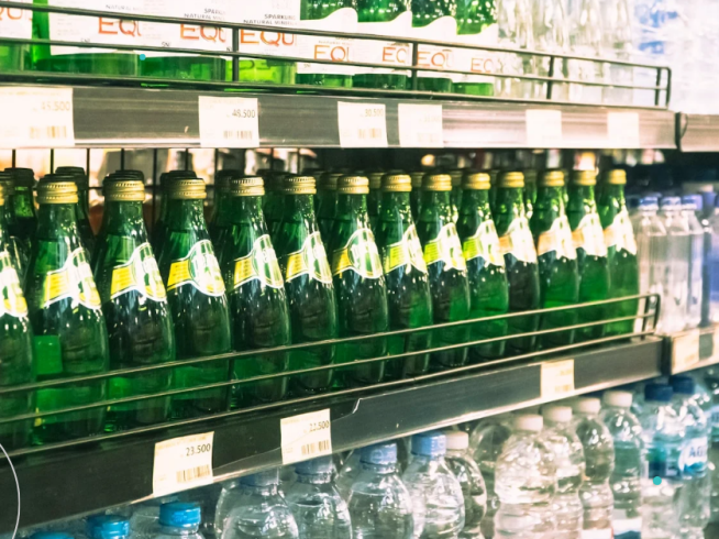 a display in a store filled with lots of bottles of water